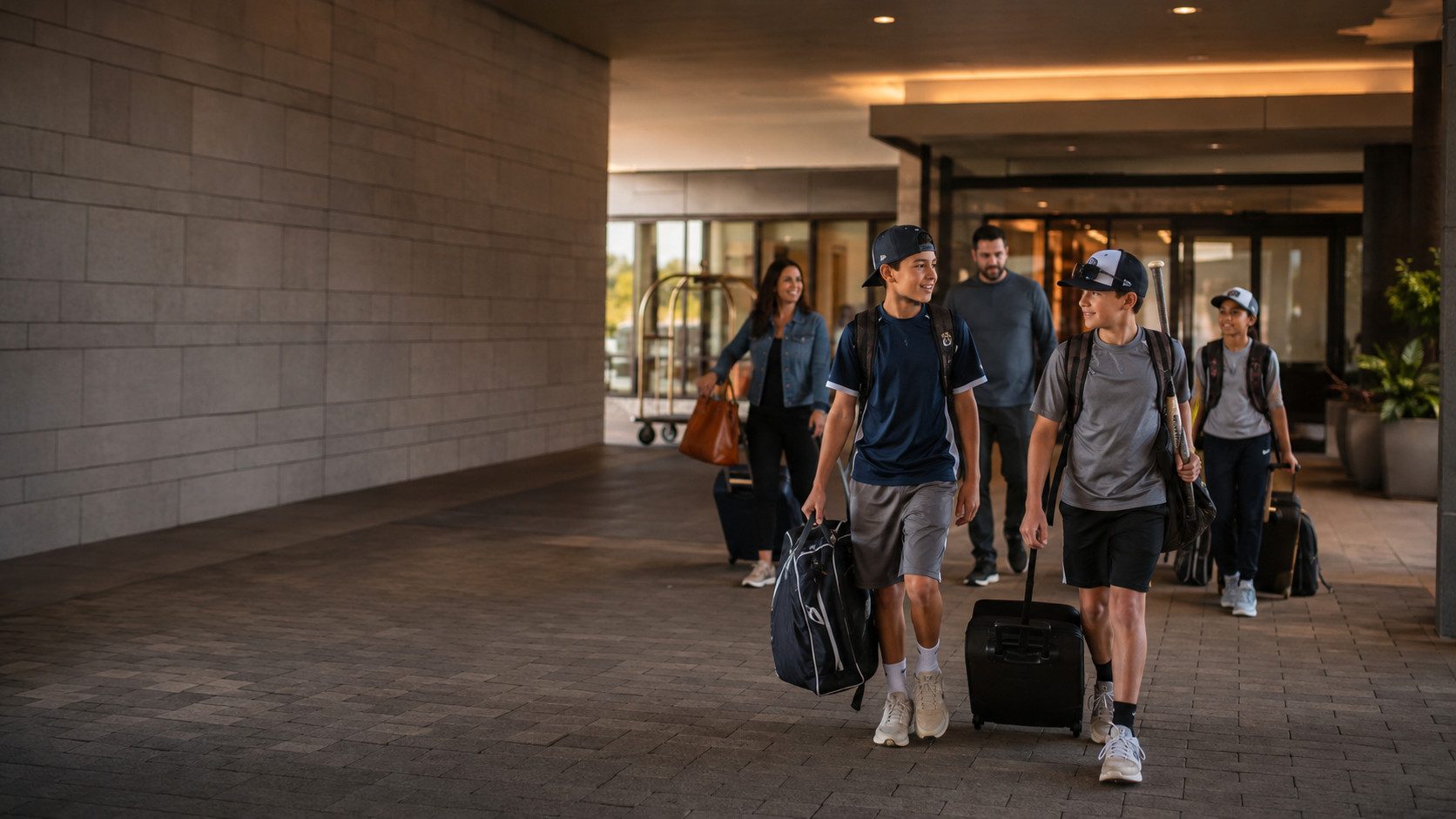 Travel athlete arriving for a tournament with family
